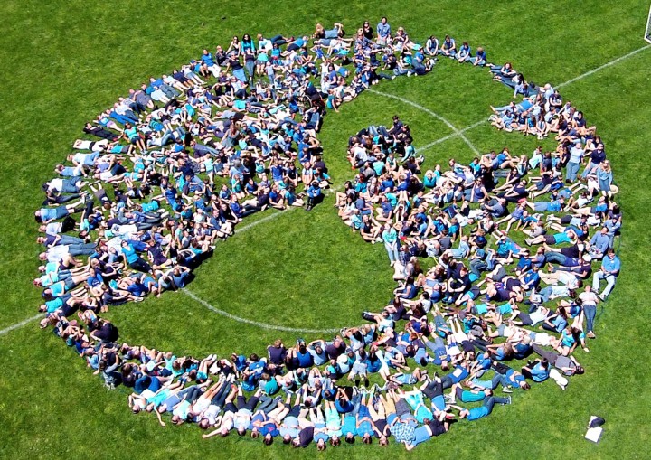 Carolina Day students create a "Living Earth" for an aerial photo. Photo courtesy of Carolina Day