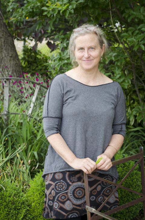 Curve Studios owner and gardener Pattiy Torno. (Carrie Eidson/ Mountain Xpress)
