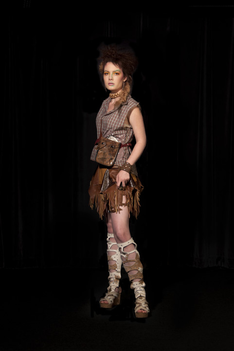 Olivia Baranowski represents the Wars of Scottish Independence, fought between the Kingdoms of England and Scotland during the late 13th and early 14th centuries. Katie Manselle from Ananda created Olivia's take on the Braveheart look by adding braids and extensions to her hair. Danielle Miller from Royal Peasantry designed the clothes, including the gladiator heels.