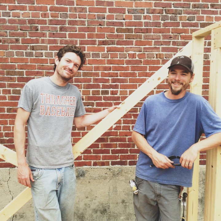 Tony Beurskens (left) and Jeramy Stauffer (right) of Nanostead as they build their first tiny home. Photo courtesy of Natalie Pollard.