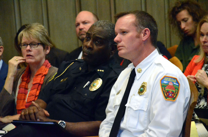 Asheville Police Chief William Anderson (left) and Asheville Fire Chief Scott Burnette listened as City Manager Gary Jackson outlined his plan to review APD operations. Photo by Halima Flynt.