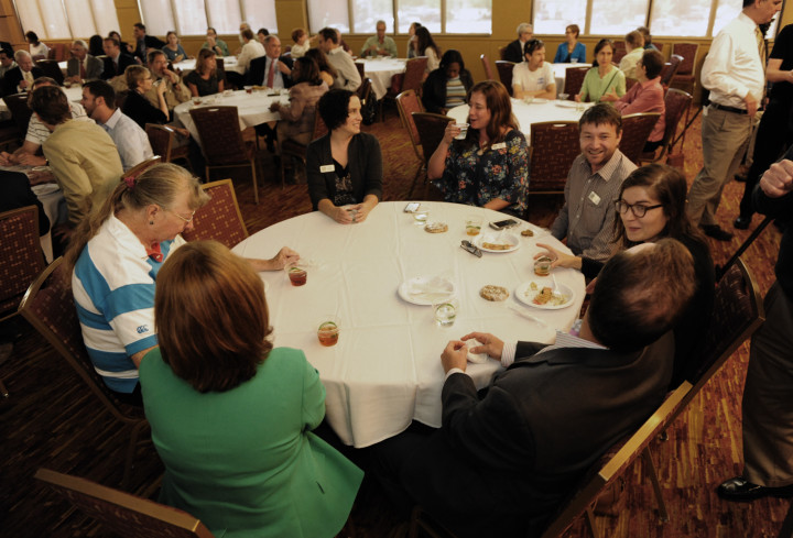 Attendees at the State of the City address ate lunch before watching the mayor's presentation. Photo by John Coutlakis