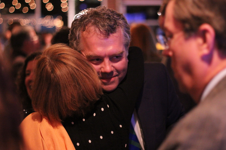 Democrat Todd Williams hugged supporters after being elected District Attorney. Photo by Jess Farthing