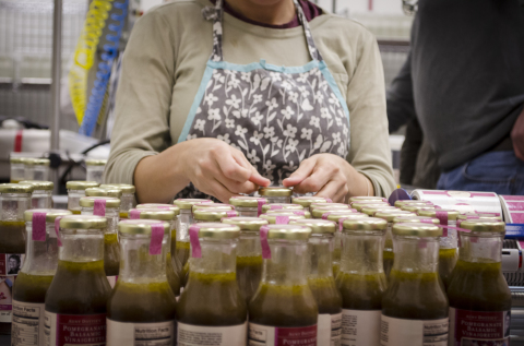 Line up the bottles: Locally owned Jenny’s Gourmet Foods is one of many for-profit ventures that use the bottling facilities at Blue Ridge Food Ventures. The company’s Aunt Dottie’s Salad Dressings are sold at over 100 Whole Foods markets. Photo by Carrie Eidson