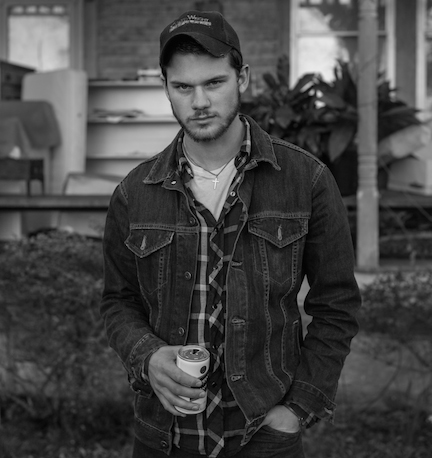 NATIVE SPEAKER: British actor Jeremy Irvine, who stars as Travis, spent months working on the WNC accent. Author Ron Rash applauds the film's actors and directors for getting the dialect right. Photo by Missy McLamb