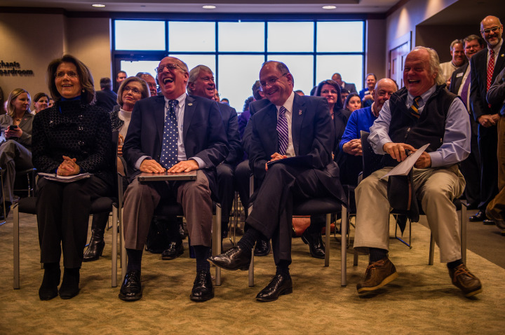 It's not all serious: from left to right, UNC Asheville Chancellor Mary Grant, A-B Tech President Dennis King, WCU Chancellor David Belcher, and State Rep. Joe Sam Queen reflect the mood of the good news during the meeting.