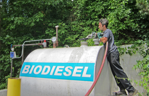 Fill 'er up: Paul Nunan of Blue Ridge Biofuels collects from a tank at Warren Wilson College