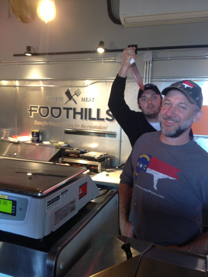 Trevon Dunn, left, and Casey McKissick, right, at Foothills Meats' downtown location inside Ben's Penny Mart