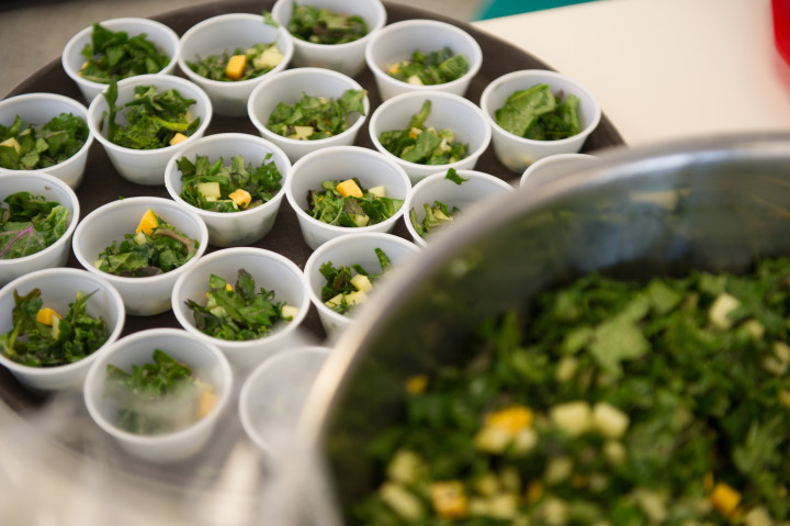 BOWL OF GREENS: Farm to School brought a kale salad to Hall Fletcher Elementary School for a recent student tasting. Photo by Pat Barcas