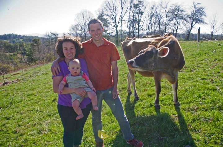 FARM FRESH: Kate and Kevin Lane (pictured with daughter Adalynn)  milk their small herd of Jersey cows by hand each day. Each cow has a name and comes when called, says Kate Lane. 