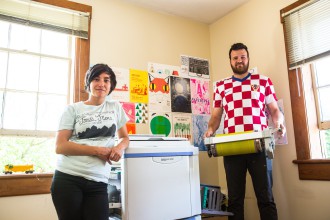 LABELED: Local beer needs local designs — Asheville-based Woolly Press handles the look and branding for such breweries as Fonta Flora, which gets its work done on a Risograph, a machine popular in the 1980s. Pictured are Mica Mead, left, and Colin Sutherland, right, of Woolly Press. 