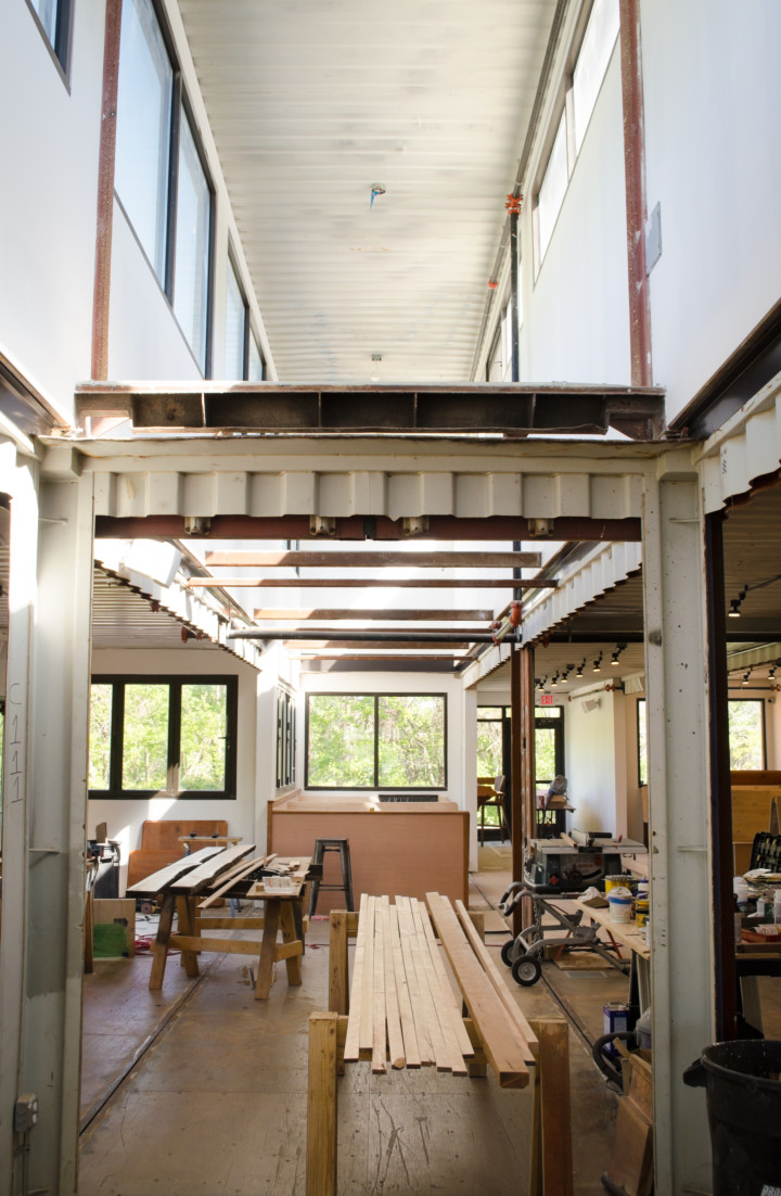The atrium at the Smoky Park Supper Club was constructed by cutting through the floor of the two containers that make up the structures top level. Removing the steel floor — which Hecker says is the thickest and heaviest part of the container — required plasma cutters and a "laborious" process, Hecker adds. 