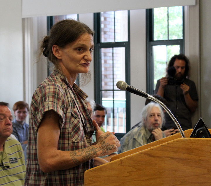 Spoon Lady Abby Roach speaks against proposed busking changes at Public Safety Committee meeting. Photo by Virginia Daffron.