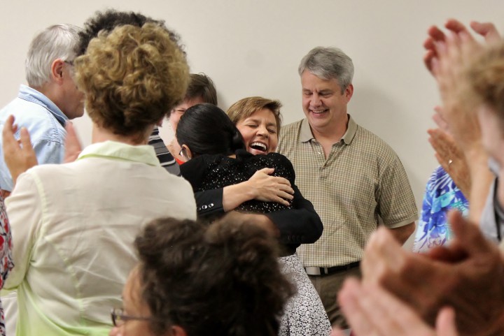 Holly Jones hugs her daughter during a standing ovation, following her announcement to run for lieutenant governor of North Carolina. Photo by Hayley Benton