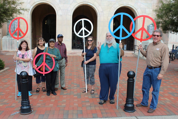 WNC 4 Peace activists invite the entire Asheville community to celebrate Sept. 21, declared the "Day of Peace" at the Peace Pole outside City Hall at noon. Photo by Virginia Daffron.
