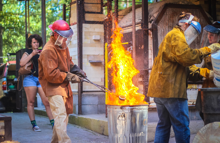 UNC Asheville students and professors in the Department of Art held a raku ceramic firing demonstration as part of the university's celebration of the Installation of Chancellor Mary K. Grant. Photo by Leslie Frempong.