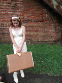 "Appalachian Runaway" $7. The slips and suitcase are from Goodwill and the shoes were a spray paint redo from the Outlet bins, as well. Model is Amie 