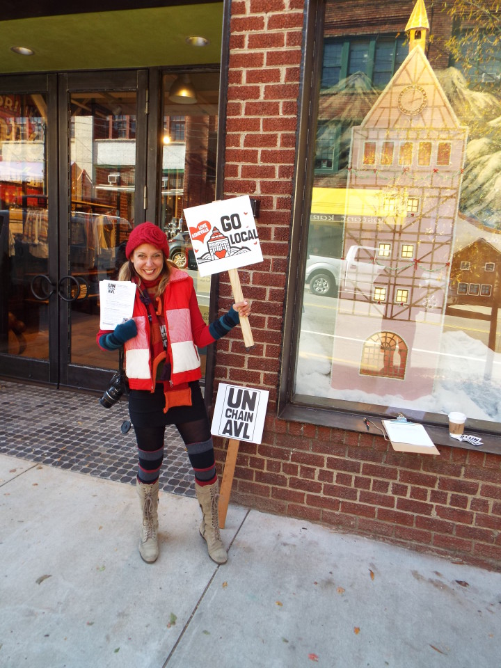 Franzi Charen encourages  folks to "Go Local" in front of Anthropologie. Photo by Able Allen