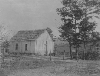 This mid- to late-1800s building was a former Presbyterian Church given by Vanderbilt to the Shiloh AME Zion Church. Shiloh residents moved the building from its original location near the French Broad River to the present-day site, where it is seen in this photo. This structure was preceded by an even earlier log building. 