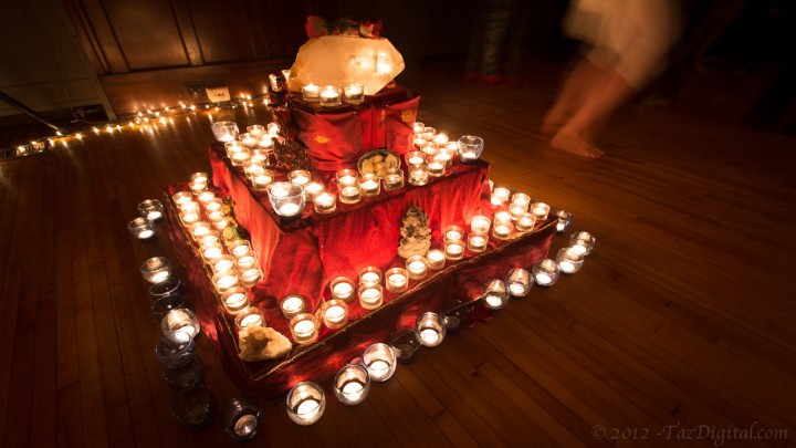 LIGHTING THE PATH: Asheville's New Year's Eve events include a host of wellness-oriented approaches, including this candlelight altar from Sangita Devi's intention-setting ceremony. Photo courtesy of Taylor Johnson of Taz Digital