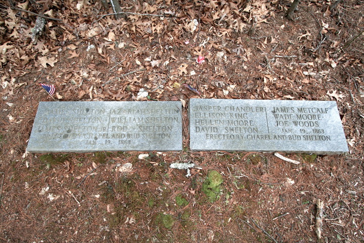 NAMES OF THE FALLEN: Two granite markers in the vicinity of their gravesites bear the names of the 13 victims of the Shelton Laurel Massacre. Photo by Max Hunt