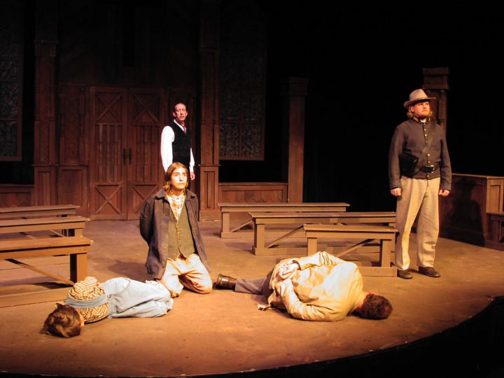 RETELLING THE TALE: A scene from the Southern Appalachian Repertory Theatre's 2005 production on the Massacre. The play premiered to sold out crowds and received praise and criticism from descendants on both sides. Photo courtesy of Bill Gregg/ Southern Appalachian Repertory Theatre, Mars Hill University
