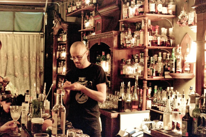 THAT'S THE SPIRIT: Casey Campfield, onwer of The Crow & Quill, has been collecting spirits of all kinds for more than a decade. His passion is evident in the bar's stock of more than 500 kinds of liquors and liqueurs. 