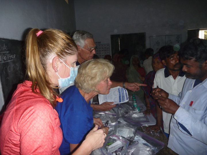 Volunteers distributing glasses in rural India. Photo courtesy of Vision Express