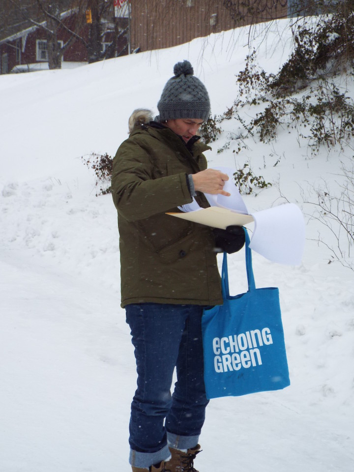 Jasmine Beach-Ferrara canvasing North Asheville during January snow event. Photo by Able Allen
