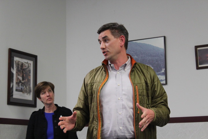 At the Feb. 29 meeting, state Rep. Brian Turner (right) and Asheville City Council member Julie Mayfield (left) explained what local and state government can (and can’t) do to address South Asheville residents’ concerns. Photo by Virginia Daffron 