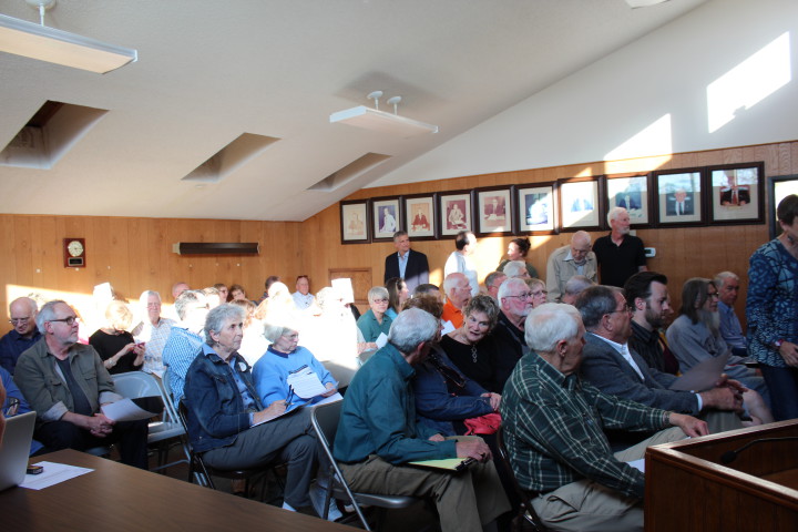 The meeting room at the Woodfin Town Hall got even fuller before the zoning board hearing began, with about 60 people standing in a hallway outside the room. Photo by Virginia Daffron