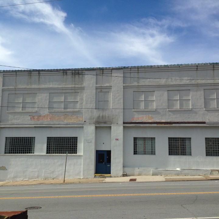The facade of AAAC's The Refinery Creator Space. A local artist will be selected to paint the building's mural. 