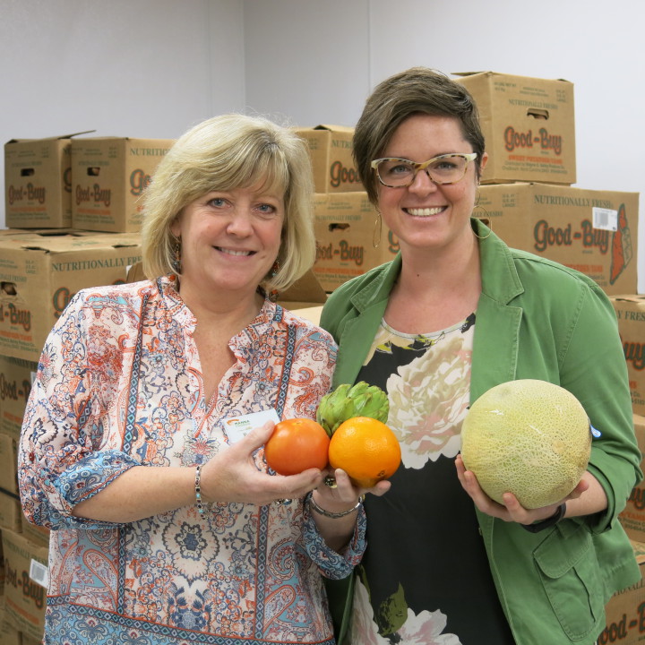DELIVERING THE GOODS: Beth Stahl (left) and Kara Irani (right) of MANNA Foodbank, gears up for their Summer Pack Program. 