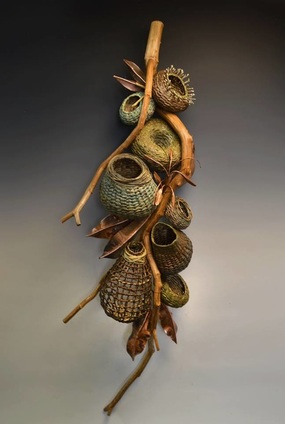 SCULPTORAL ART BASKET: ​Tommey's works range from individual sculptures to a gathering of baskets, seen here. 