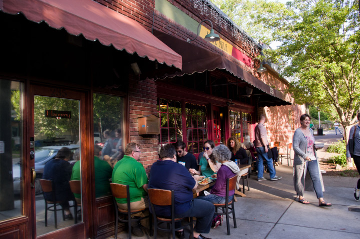 NEIGHBORLY: North Asheville has long been a thriving neighborhood, with its own restaurants and bars. Today the tradition continues with successful businesses such as Nine Mile, which now has a second location in West Asheville. Photo by Cindy Kunst 