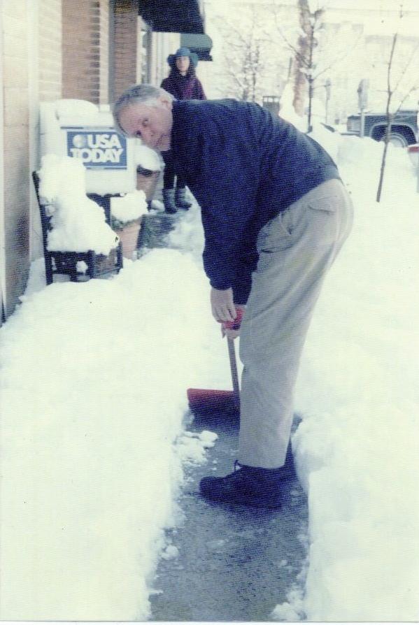 SNOW SERVICE: With the city's downtown an afterthought, much of what we take for granted today was simply ignored. Priced jumped in to help whenever he could. Photo by Margaret Williams