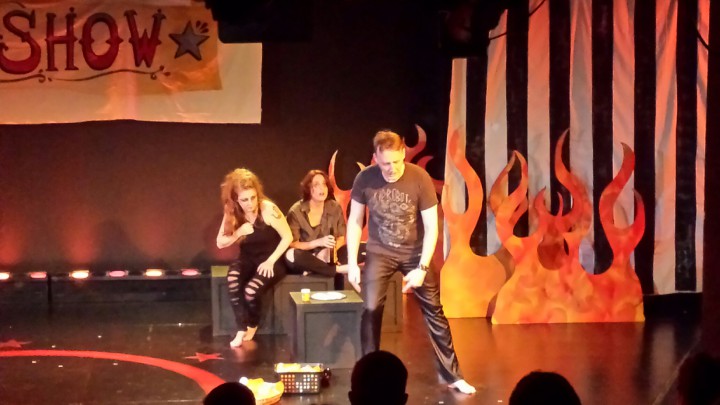 A scene from "Gluttony" in Act 2 of Sideshow