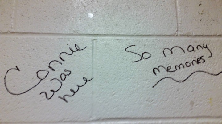 Signatures on the wall of a math classroom