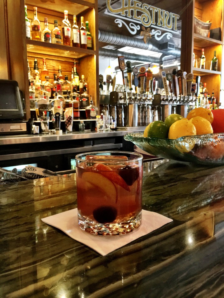 HONEY PEACH OLD FASHIONED: At Chestnut guests can help the bees by ordering a round of this bourbon based beverage. Photo courtesy of Chestnut 