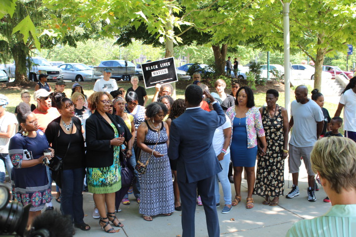 Williams family members and supporters gathered for a press conference at Pack Square Park. Photo by Virginia Daffron
