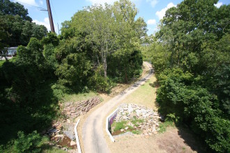 A GREENWAY RUNS THROUGH IT: One of the more transformative projects set to begin in Spring 2017 is the expansion of several greenways into the RAD. Greenway segments like the mostly completed portion of the French Broad River Greenway - West by New Belgium (above), will offer scenic, off-road options to pedestrians and cyclists and link to surrounding parts of the city. Photo by Max Hunt