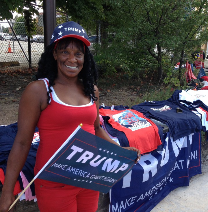 Angel Hill, merchandise vendor and Trump supporter, said she's "Making so much money." Photo by Dan Hesse