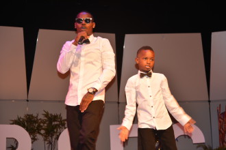 Hip-hop artist GPE Kade performs with his son, Kendrick. Photo by Leslie Boyd
