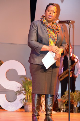 Historian Priscilla Ndiaye accepts her Unsung Heroes Award. Photo by Leslie Boyd