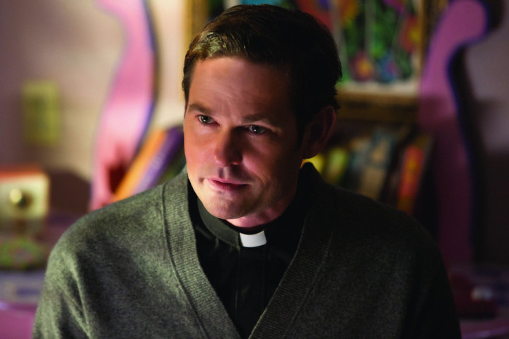 . Film Title: Ouija: Origin of Evil HENRY THOMAS as Father Tom in "Ouija: Origin of Evil." Inviting audiences again into the lore of the spirit board, the supernatural thriller tells a terrifying new tale as the follow-up to 2014's sleeper hit that opened at No. 1. Photo Credit: Justin M. Lubin HENRY THOMAS as Father Tom in "Ouija: Origin of Evil."  Inviting audiences again into the lore of the spirit board, the supernatural thriller tells a terrifying new tale as the follow-up to 2014â€™s sleeper hit that opened at No. 1.  In 1965 Los Angeles, a widowed mother and her two daughters add a new stunt to bolster their sÃ©ance scam business and unwittingly invite authentic evil into their home.  When the youngest daughter is overtaken by the merciless spirit, this small family confronts unthinkable fears to save her and send her possessor back to the other side. Uploaded by: kl