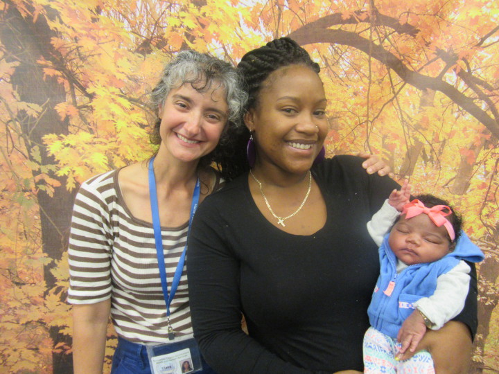 Roshana McKnight (Mother), Zolei Burgin (Baby), and NFP Nurse Claire Fontaine celebrate graduation from the NFP program.