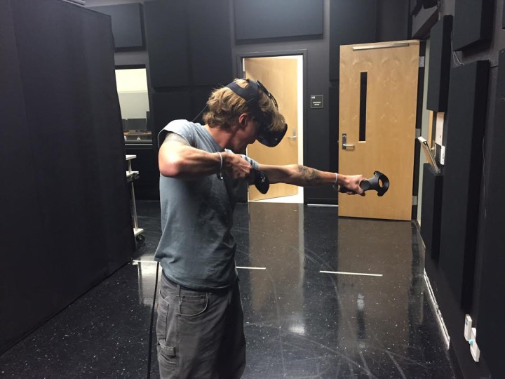 REALITY BITES: Writer Timothy Burkhardt tries out a virtual reality game at Blue Ridge Community College. Photo by Patrick Roeder