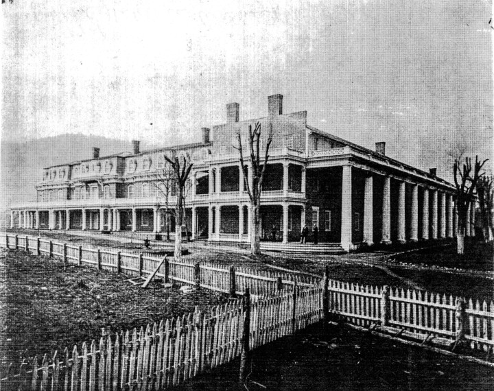 WEALTH IN THE WILDERNESS: As access to outside building materials and a growing tourist population coming through the Drovers Road expanded in the mid-1800s, luxurious, modern hotels and residences, like the Warm Springs Hotel, above, made Hot Springs and other WNC communities playgrounds for the wealthy, even as farmers a few ridgelines over largely subsisted on what was available on their land. Photo via Della Hazel Moore