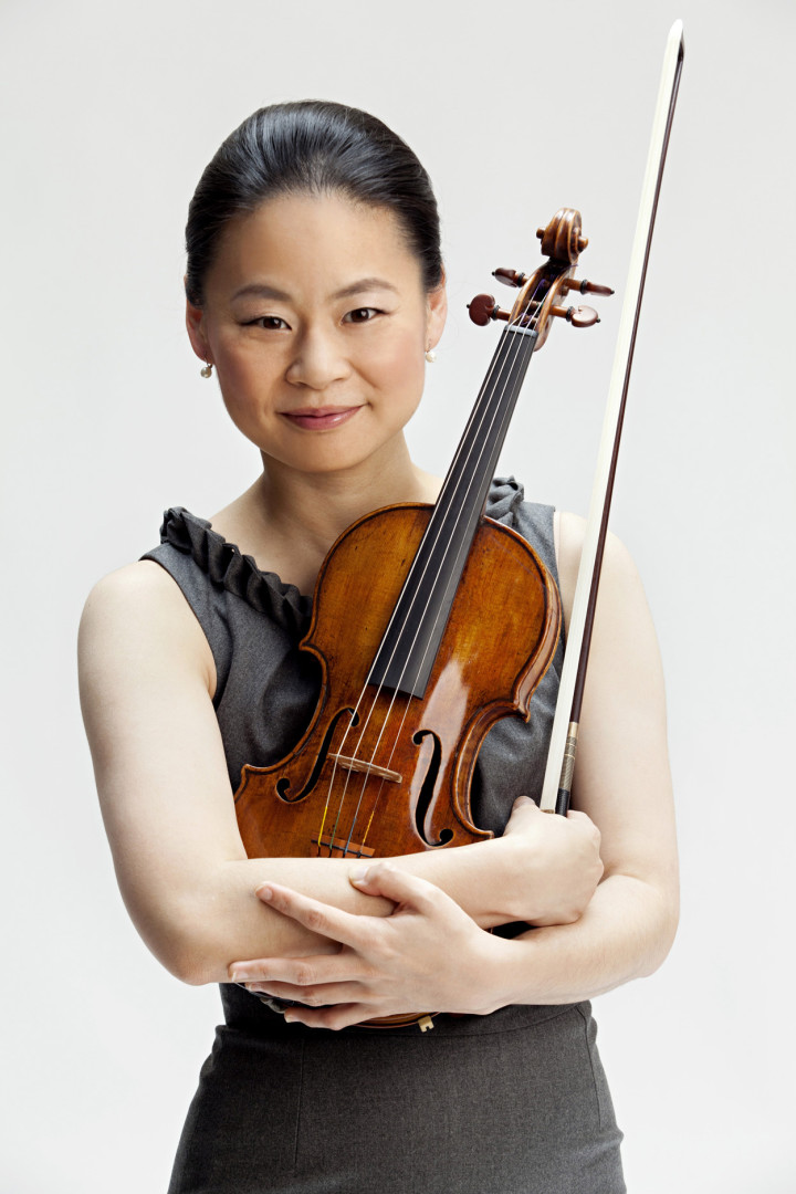 INSTRUMENTAL: Violinist Midori is not only the festival’s featured performer but will spend a weeklong residency worth with students of the Asheville Symphony Youth Orchestra. Midori plays a 1734 Guarnerius del Gesù "ex-Huberman" violin. etween a player and a violin exists a unique chemistry,” she says. “A violin can inspire as well as to criticize its player, and a player grows with the instrument.” Photo by Timothy Greenfield-Sanders 