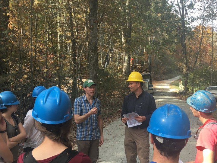 FRIENDS OF THE FOREST: Rob Lamb (left) and Andy Tait  of EcoForesters guide the Yale Graduate School of Forestry and Environmental Science students through a southern Appalachian forest. Photo courtesy of EcoForesters 